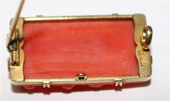 An 18ct gold mounted carved coral brooch, in fitted gilt tooled red leather box, 1.25in.
